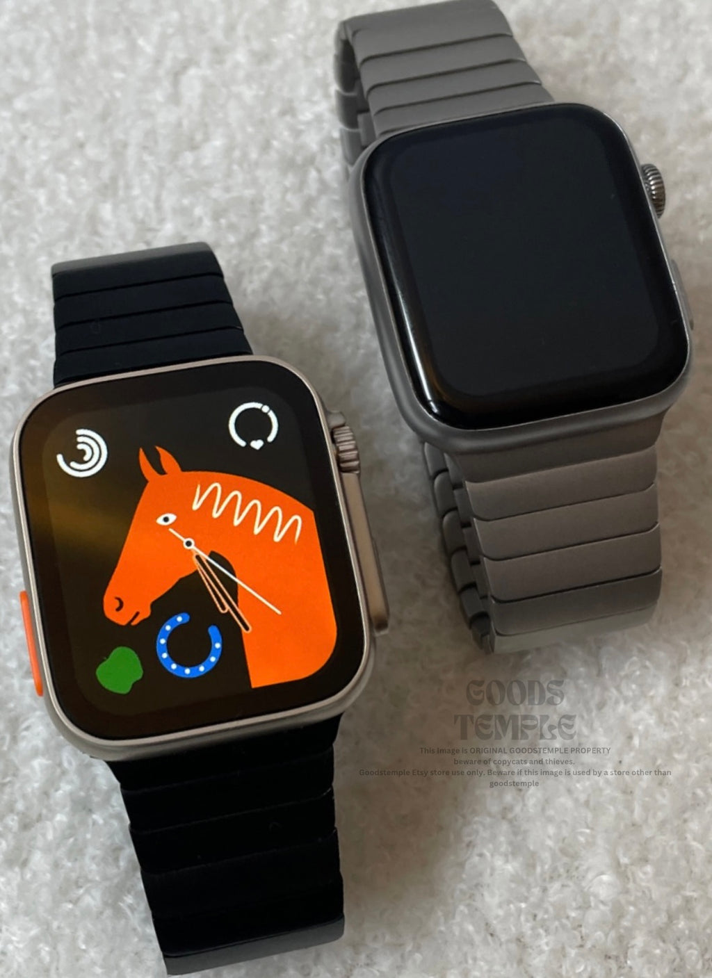 Two smartwatches on a textured surface, one displaying a horse illustration.
