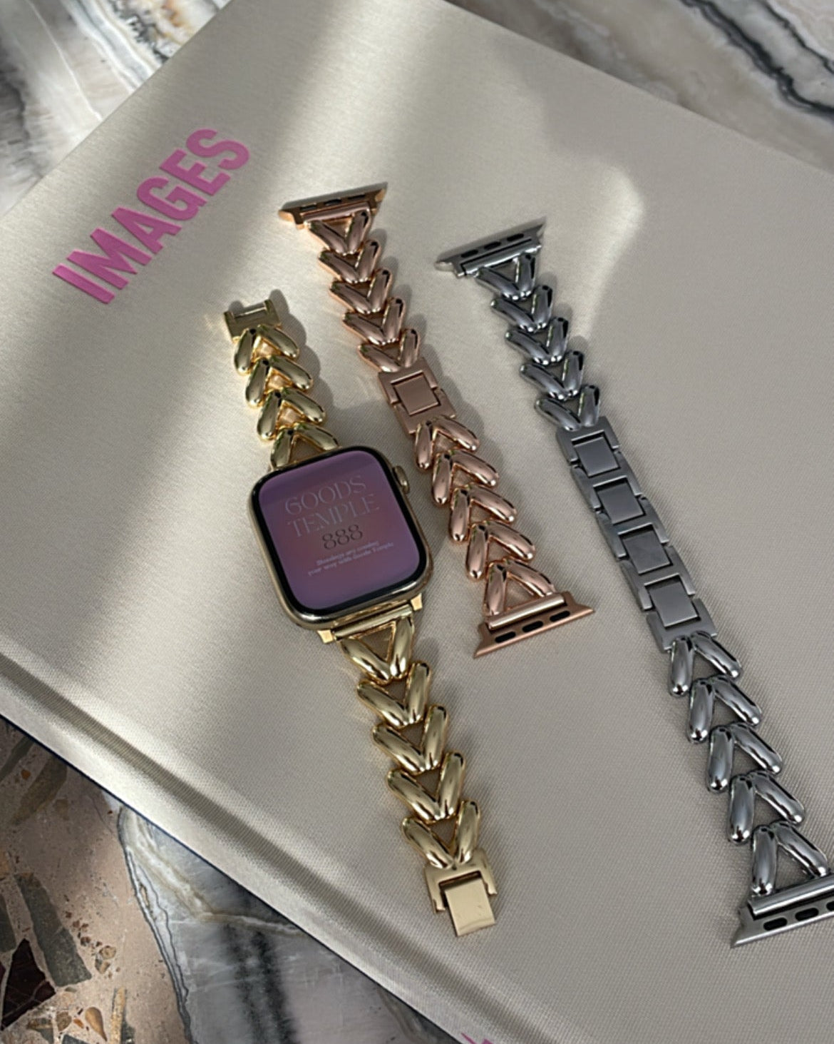 Three metallic watch bands on a white surface with 'IMAGES' branding.