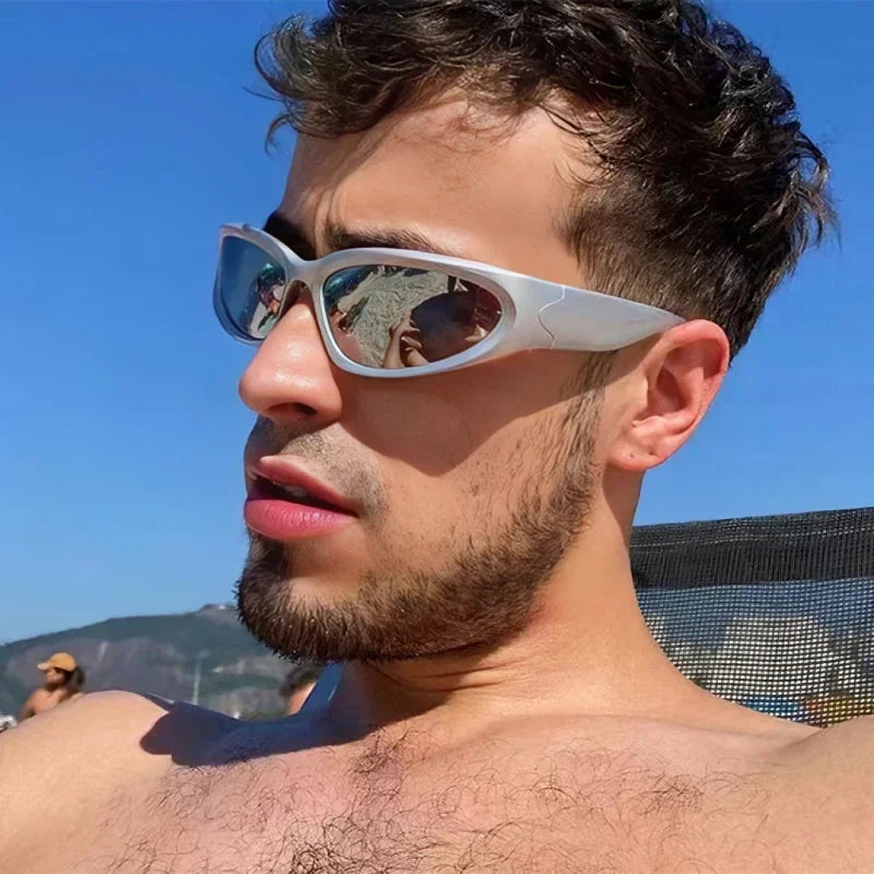 Man wearing sunglasses with a scenic background